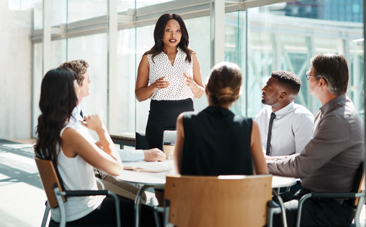 group of businesspeople having a meeting in a modern office